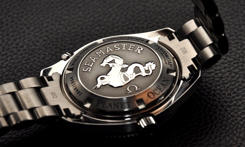 Brushed steel Omega Seamaster Ploprof caseback with seahorse engraving and technical markings