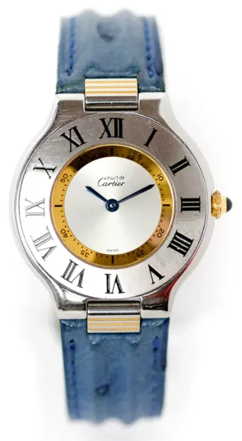 Must 21 acier et or, lunette gravée de chiffres romains